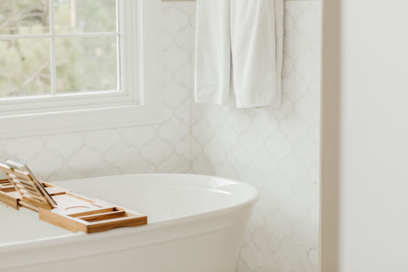 A beautiful tiled bathroom after recieving small updates from the team at Footprints Bath and Tile.