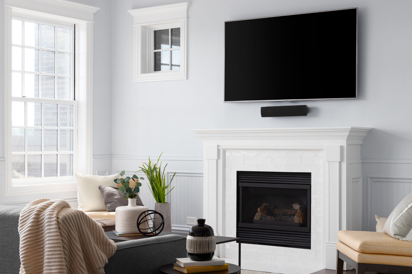 An image of a fireplace with high-quality tile installed - contact Footprints, a one of the top tile installation companies for your service today.